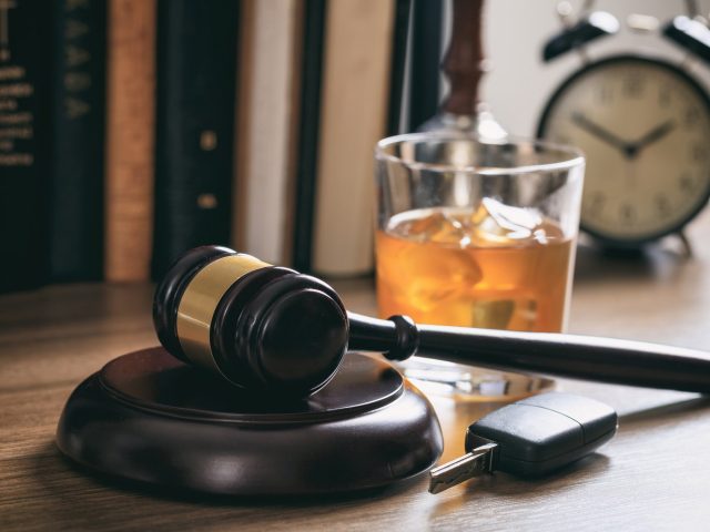 Law gavel, alcohol and car keys Rhode Island Liquor Liability Act